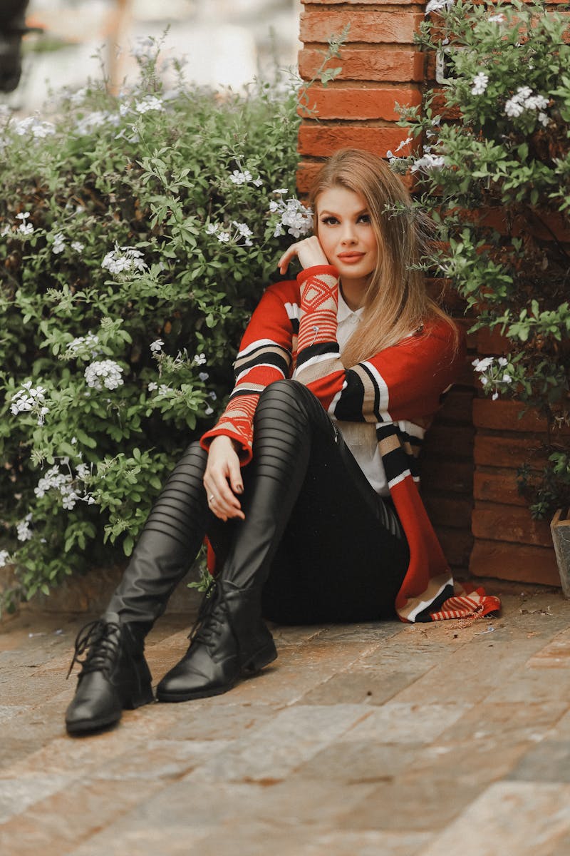 Beautiful Woman Sitting on Sidewalk